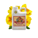 Advanced Nutrients B-52 250mL in transparent background with flower behind it
